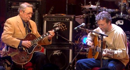 Scotty Moore, Elvis' original guitar player, and Eric Clapton perform a Vinyl Record Memories tribute to Elvis.