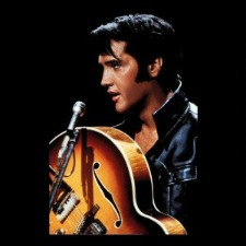Elvis holding the Gibson Sunburst Super 400 CES, the one he plays on the '68 Special.