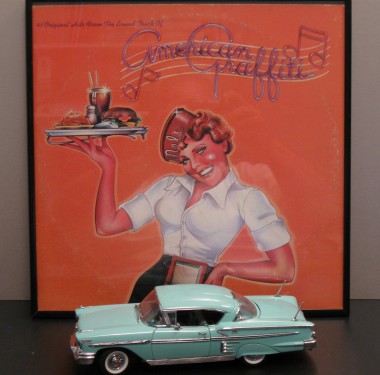 My original American Graffiti album and classic '58 Chevy Impala Danbury Mint collectible, both purchased new.