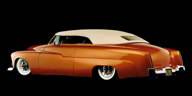 1951 Mercury Custom know as - Sundance - Dick Dean Custom. Carson top, 4 corner air ride, House of Kolor 7 stage custom orange paint, Chevy 350 engine, Neon underbody lighting & Cadillac wheel covers.