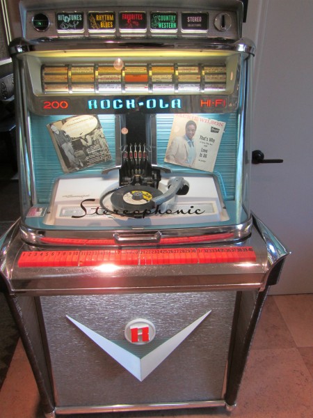 Click on jukebox link or photo to expand then arrows to expand to view Jackie Wilson picture on record. 1959 Rockola Jukebox.