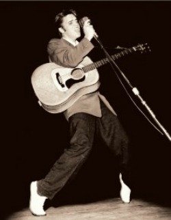 A young Elvis around 1954. Read the Elvis Presley story at Vinyl Record Memories.