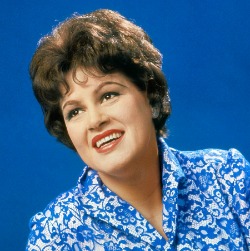 Patsy Cline sings with The Jordanaires in the background. The best cover ever on You Belong to Me.